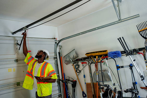 Professional Garage Door Panel Replacement technician working in Blue Earth, MN